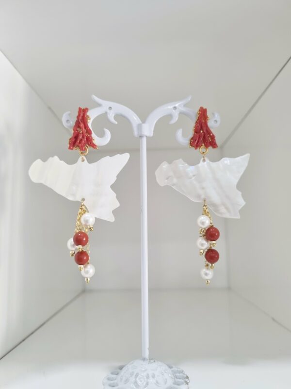 Earrings made with mother of pearl, coral, freshwater pearls and coral paste. Weight 5.7g Length 7cm