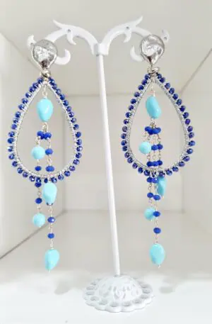 Earrings made with crystal and turquoise fabric. Silver-plated brass elements. Length 11cm Weight 8.2gr