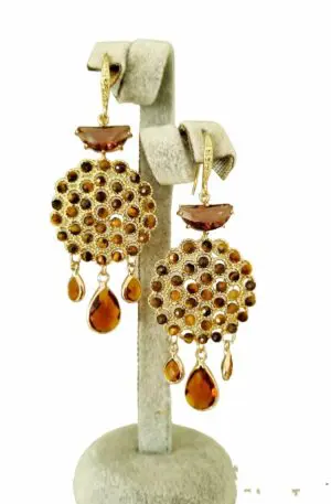 Earrings made with tiger's eye and crystals surrounded by brass. Weight 7.4 g Length 7.5 cm