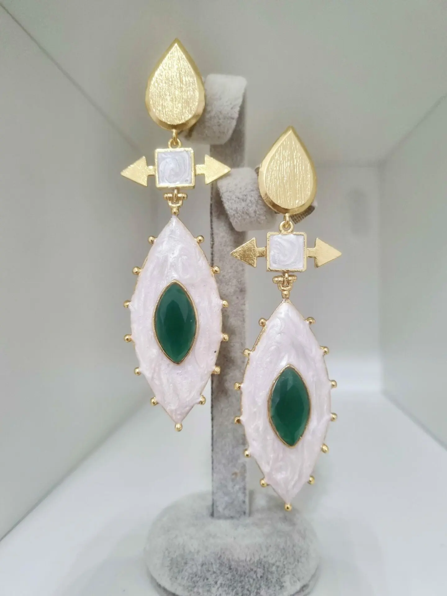 Earrings made on an enamelled brass base and green agate centre. Weight 15.3g Length 9cm