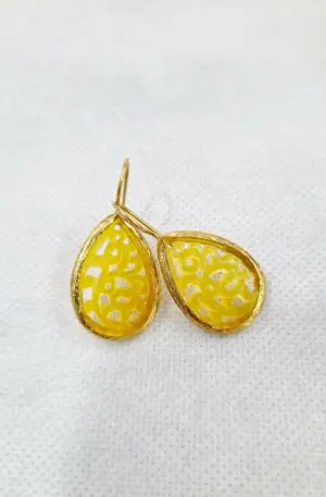 Earrings made with jade surrounded by brass. yellow colourLength 3.5cmWeight 2.1gr