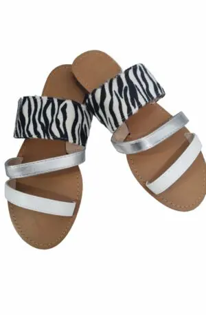 Slippers with stripes in eco-leather and zebra-print suede. Rise 1.5 cm