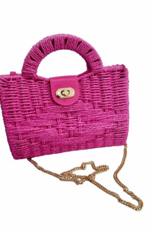 Bag made of fabric and eco-leather inserts, equipped with golden shoulder strap, lined interior with open side pocket. Base with studs. Measurements L23 H17 B6.5 Fuchsia colour