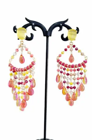 Earrings handcrafted with crystals and quartz. Weight 7.7g Length 8cm