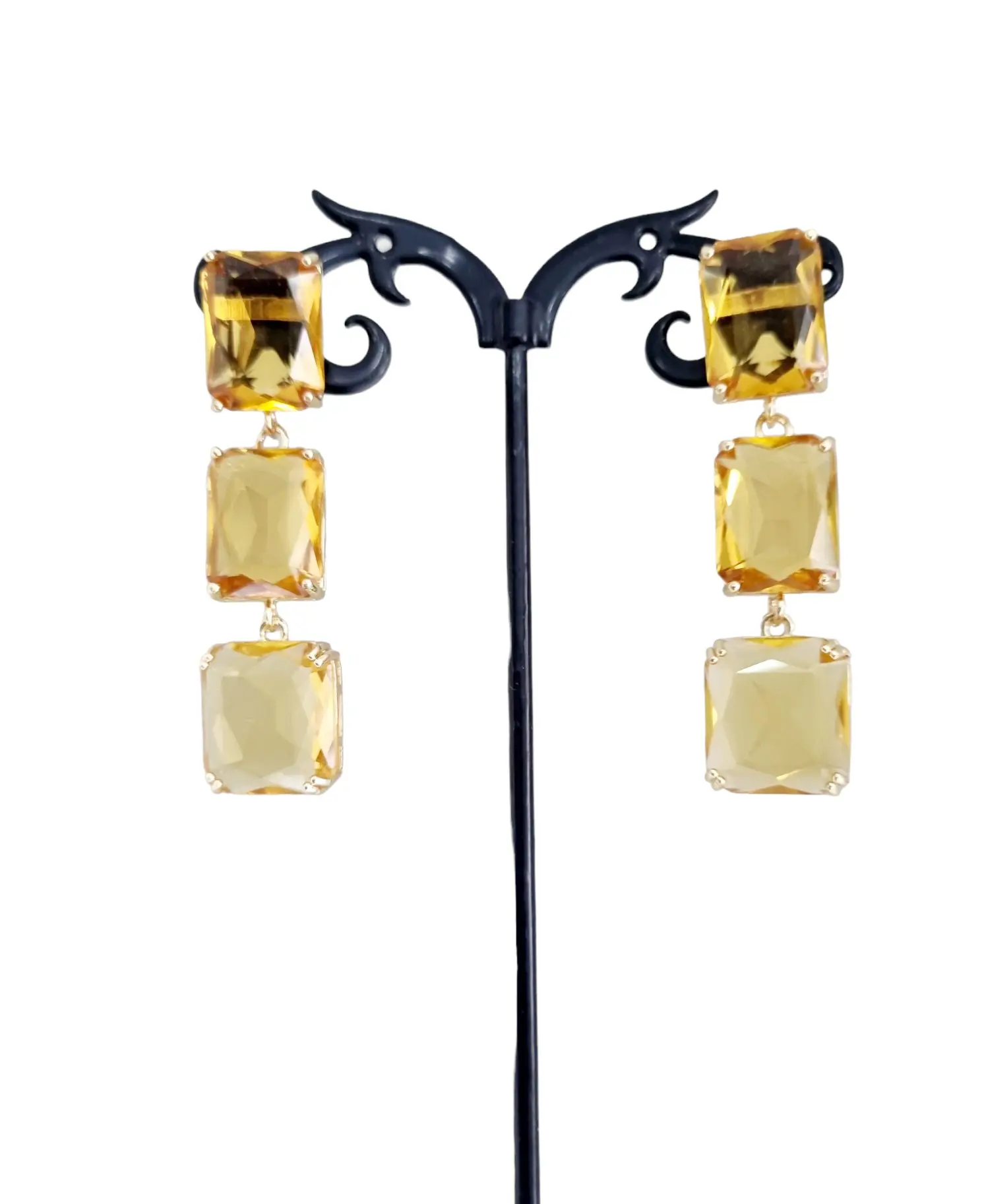 Earrings made with brass surrounded crystals. Length 5.5cm Weight 8.4g