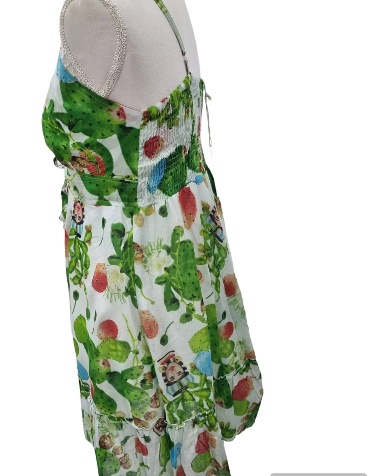 Short dress 100% cotton with adjustable straps, elasticated back. One size fits all. Prickly pear pattern