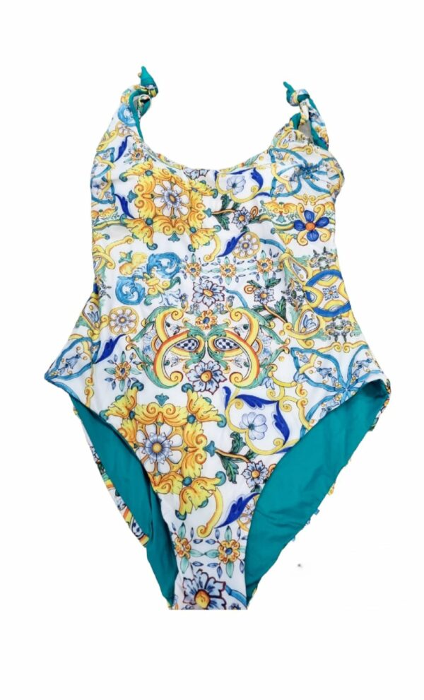 Reversible one-piece swimsuit with adjustable straps with bow and internal cups. Vietri and green pattern