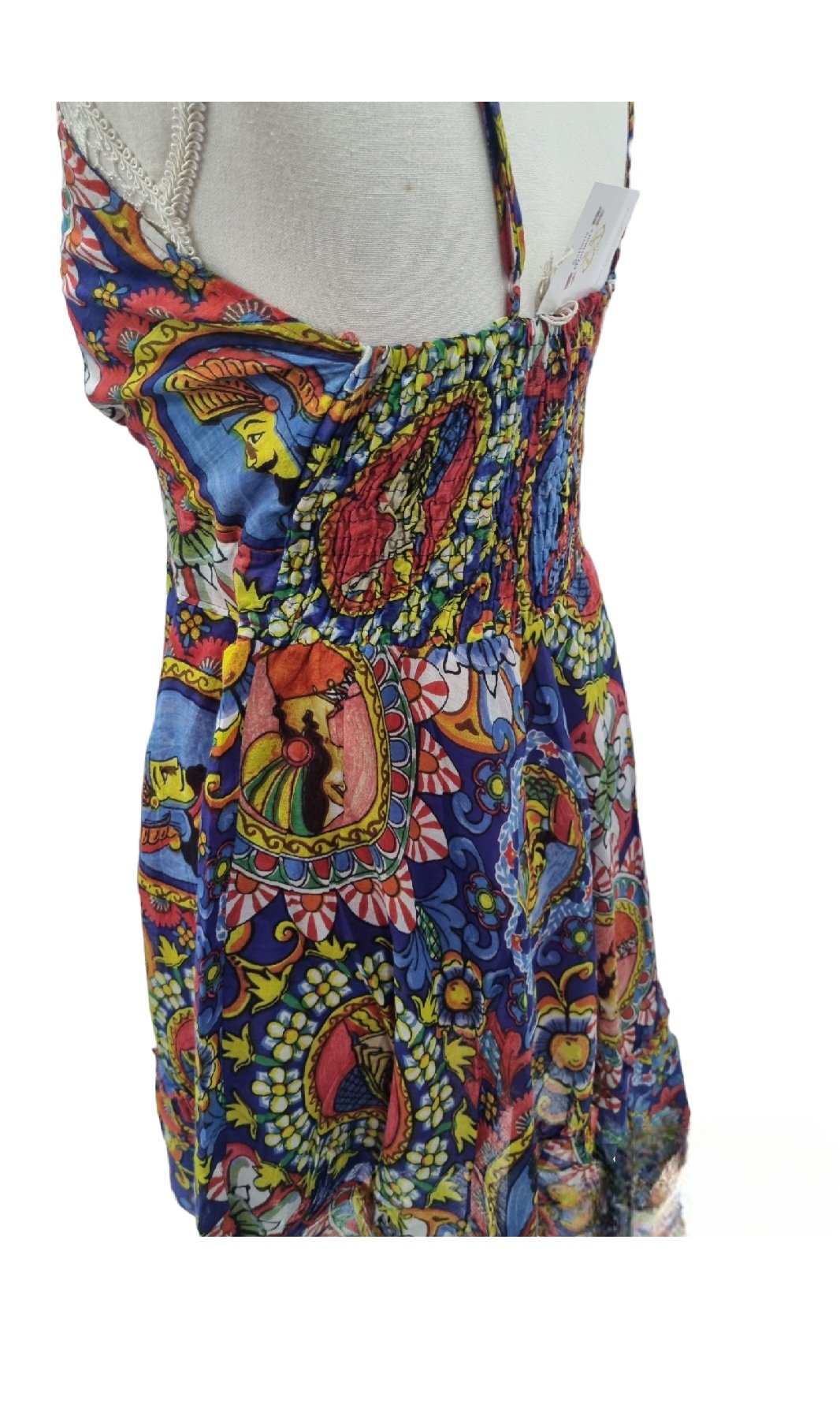 Short dress 100% cotton with adjustable straps, elasticated back. One size Pupi pattern