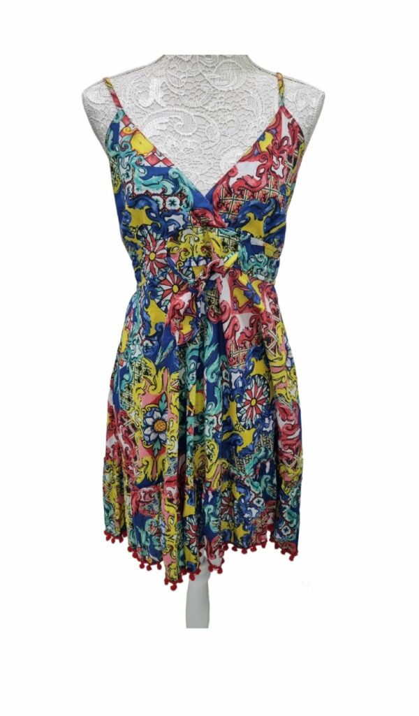 Short 100% cotton dress with adjustable straps, elasticated back and pom pom ends. One size Rosalia women's pattern