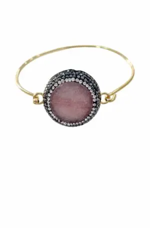 Armband aus Messing mit zentralem rosa Achat, Markasit und Lichtpunkten.