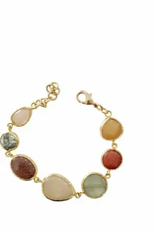 Bracelet made with agate surrounded by brass. Adjustable length up to 20cm