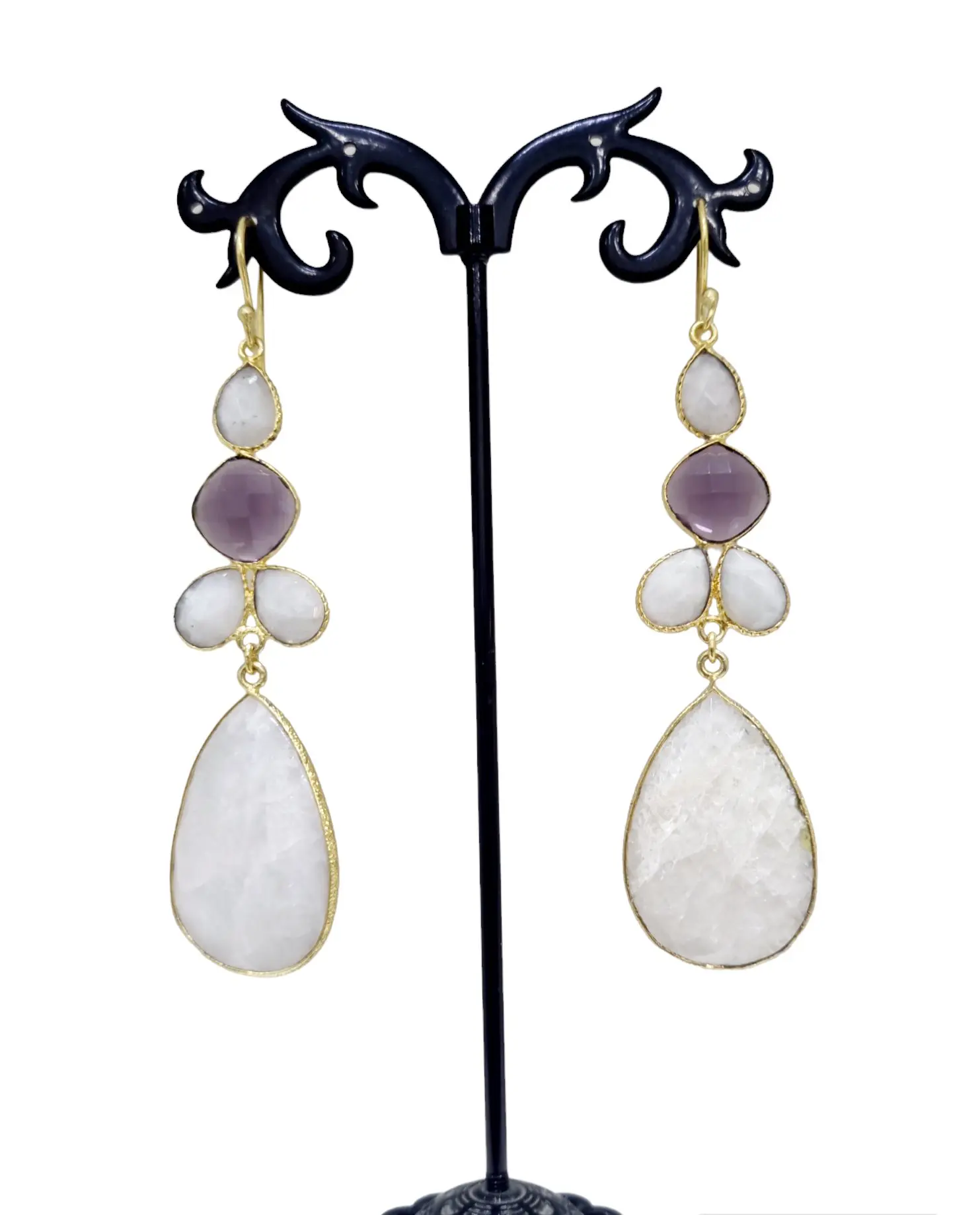 Earrings made with amethyst and moonstone surrounded by brass. Length 9cm Weight 8.9gr