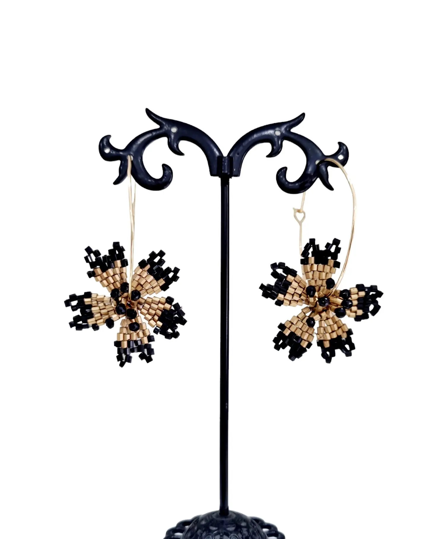 Steel hoops with flower handcrafted with black and golden microbeads. Hoop circumference 4cm Length 6cm Weight 2.8g