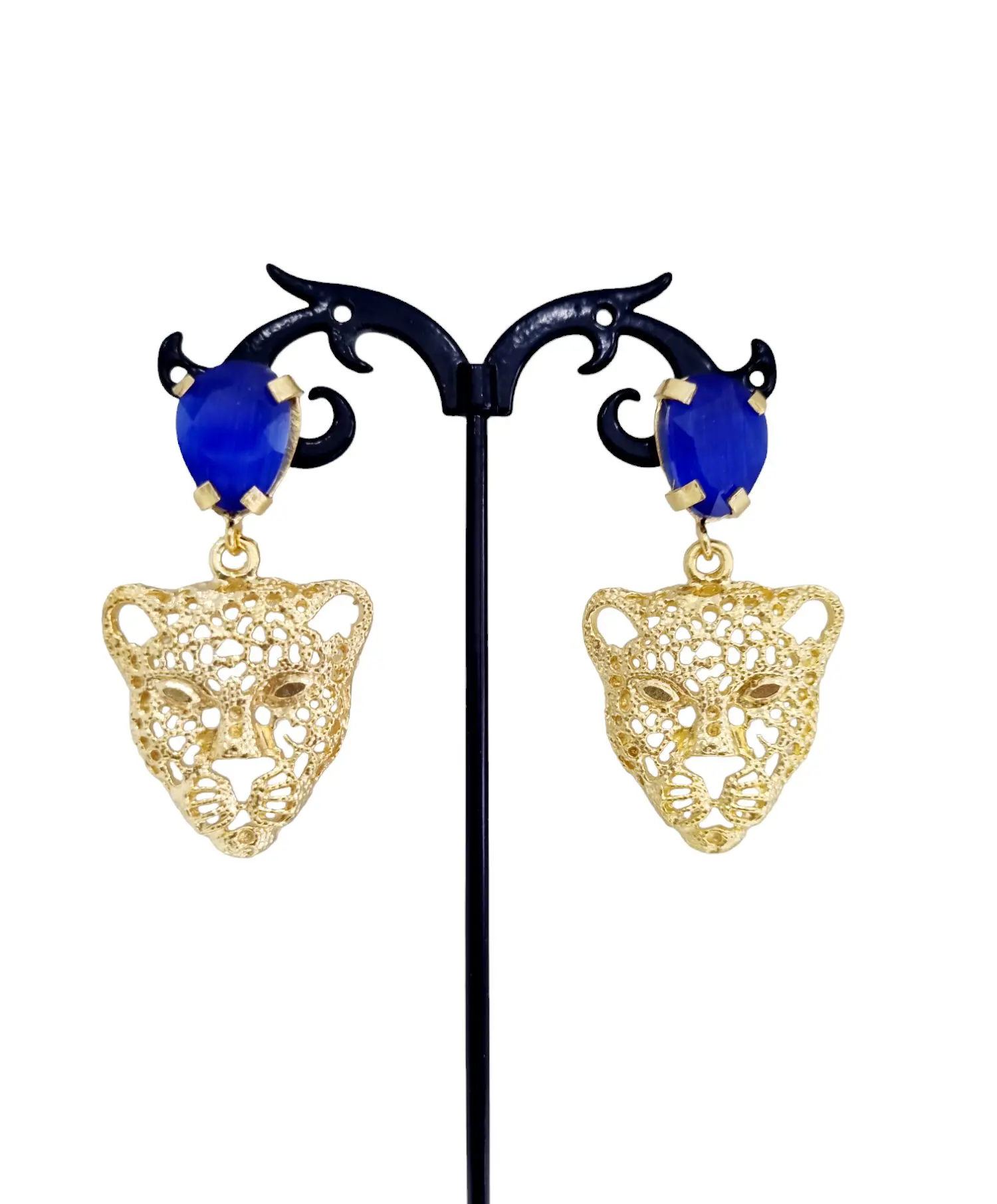 Earrings made with brass tiger and electric blue cats eye pin. Length 5.5cm Weight 8.8gr
