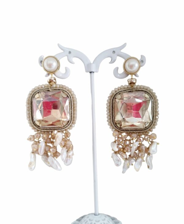Earrings handcrafted with crystals and freshwater pearls. Weight 16.5gr Length 7cm