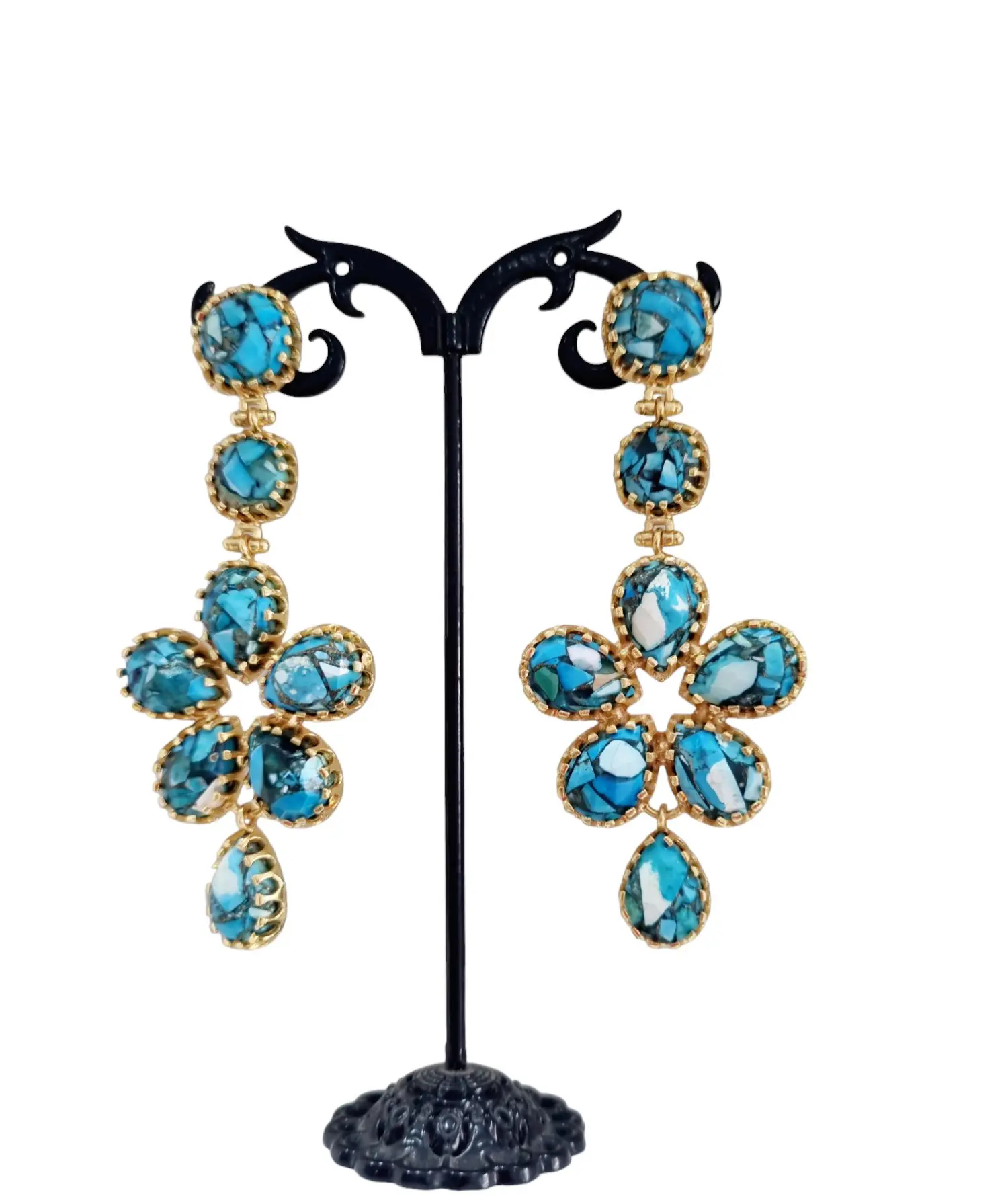 Handcrafted earrings with turquoise set in brass. Length 8.5cm Weight 16.4gr