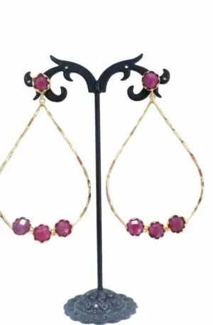 Earrings made with polished beaten brass and set with ruby root. Length 7.5cmWeight 5.7gr