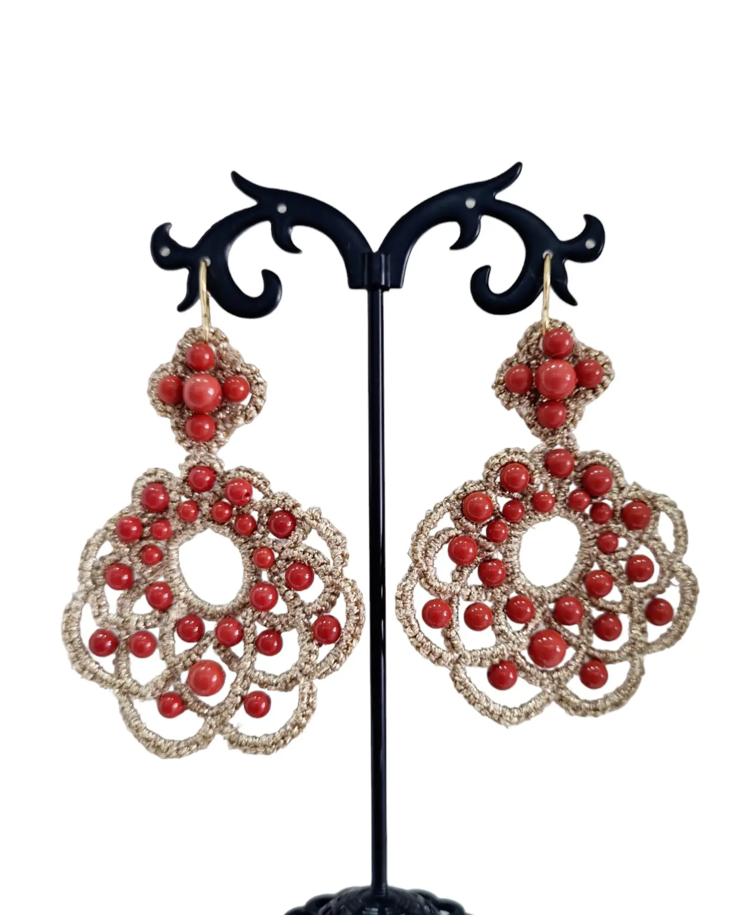 Earrings made with golden fabric and coral paste. Length 7cm Weight 4.1gr