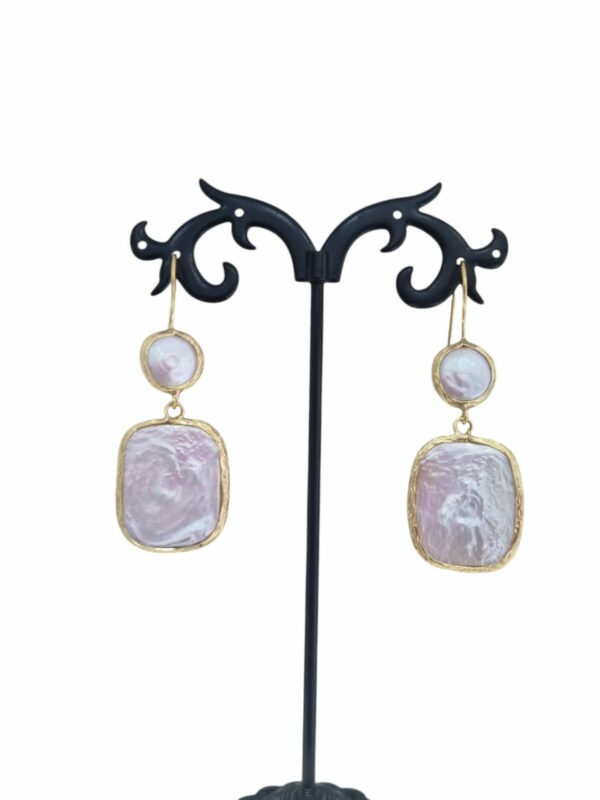 Earrings made with flat river pearls surrounded by brass. Length 5.5cm Weight 4.1gr Free shipping