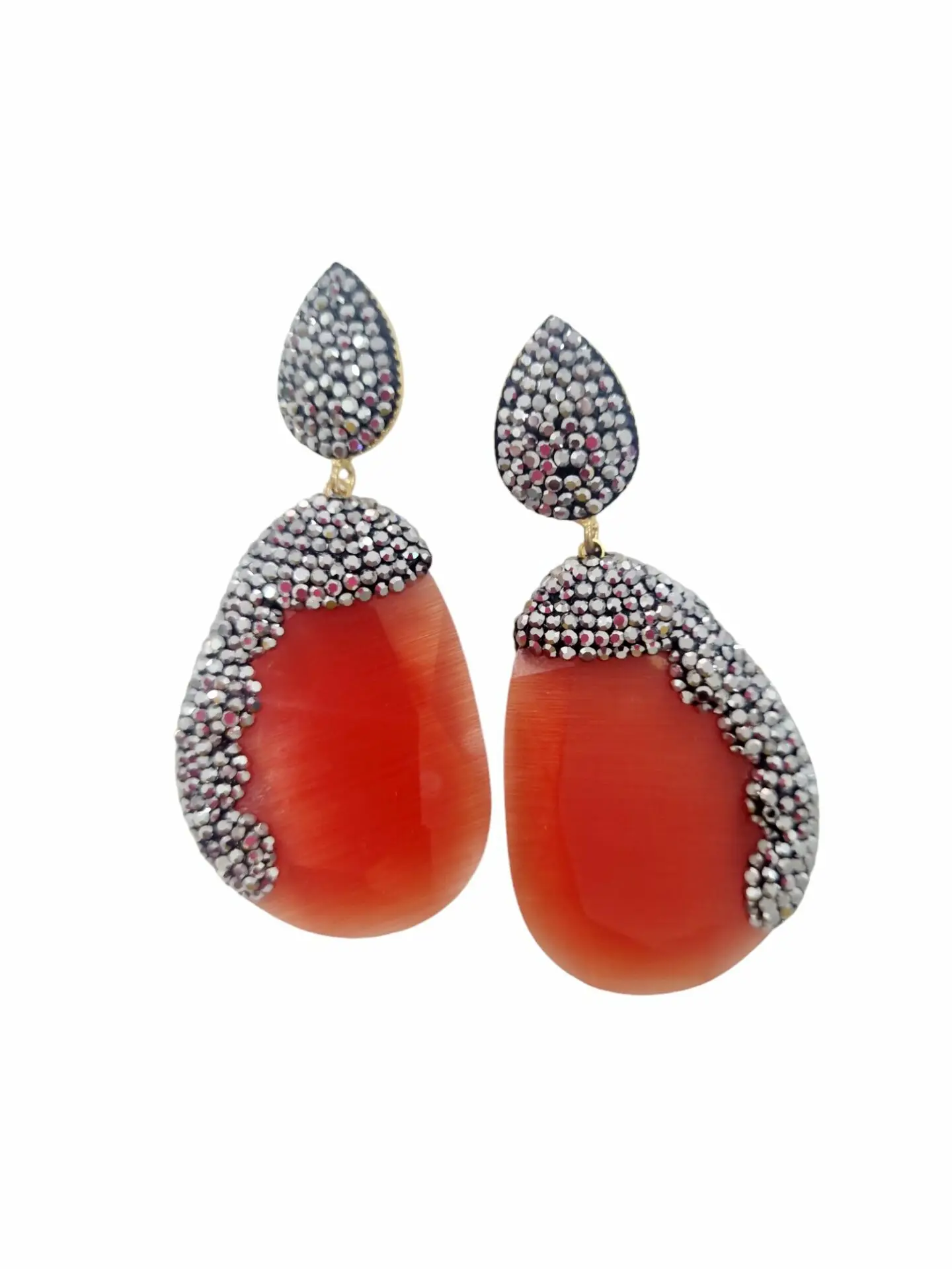 Earrings made with orange cat's eye and marcasite.Weight 11.7grLength 6cm Free shipping