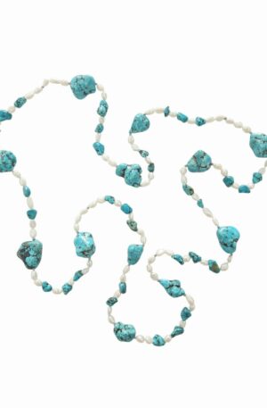 Collana lunga possibilità di fare doppio giro realizzata artigianalmente con perle di fiume, turchese ed ematite.
lunghezza 120cm Spedizione Gratuita