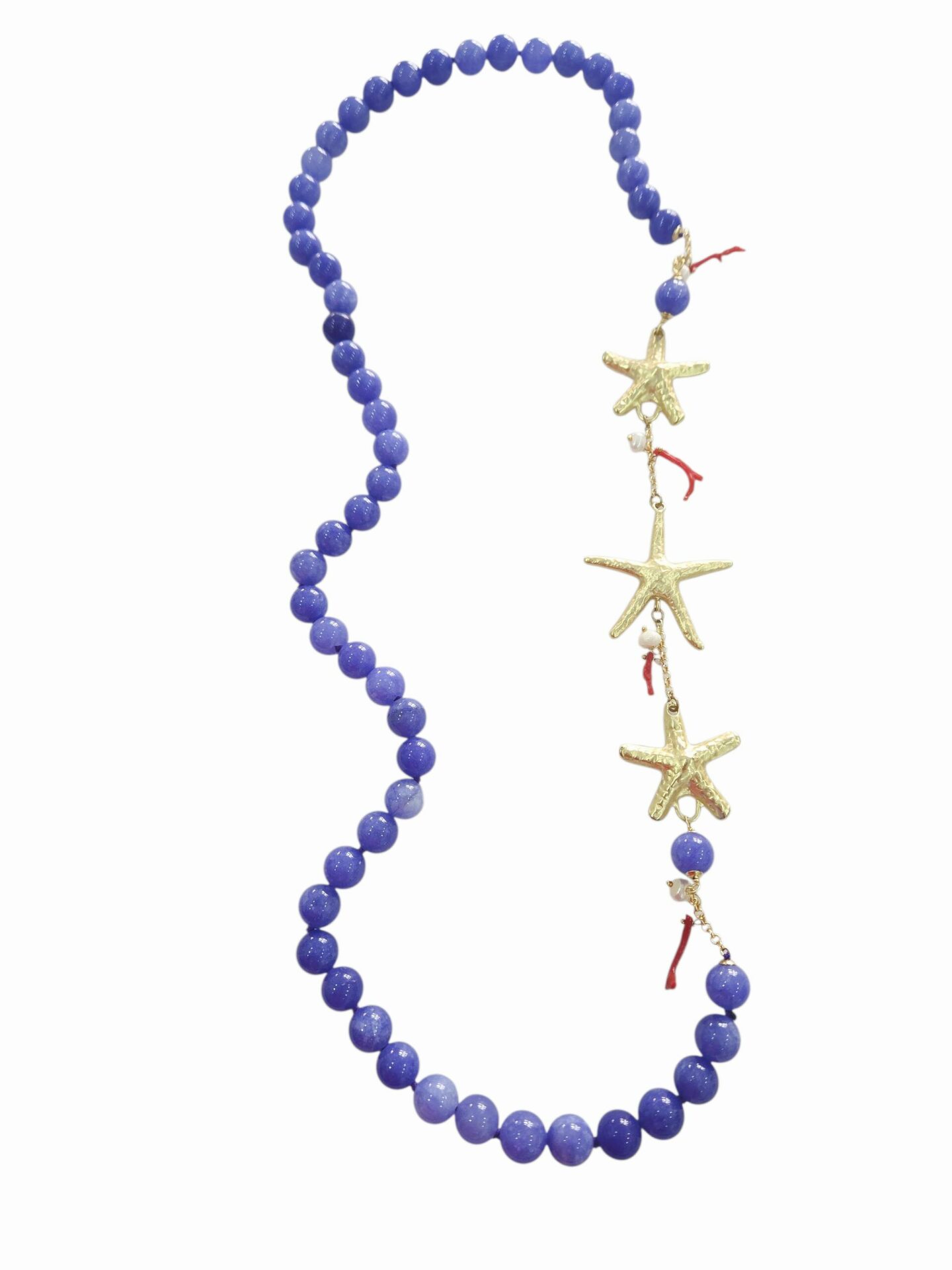 Collana lunga realizzata con agata liscia violacea, stelle in ottone,perline di fiume e rametti di corallolunghezza 78cm Spedizione Gratuita