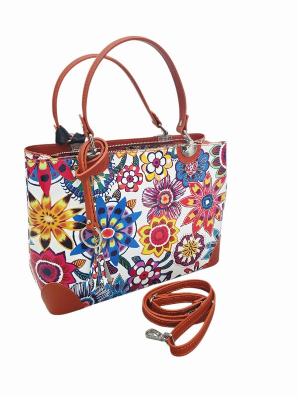 Borsa vera pelle,made Italy, pelle stampata multicolore, interno foderato con 3 scomparti e tasche laterali. chiusura con zip. dotata di tracolla Misure L 32 B12 H24 Spedizione Gratuita