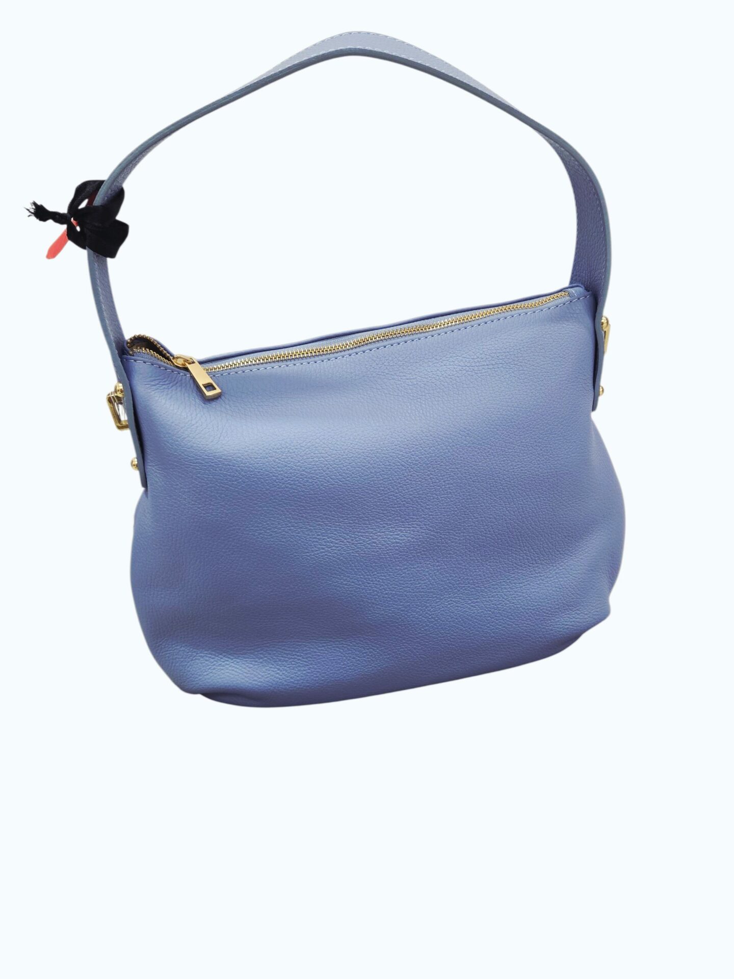 Borsa in vera pelle celeste polvere manico ampio e tracolla interno foderato con scomparti laterali due aperti uno con zip. Chiusura con zip. Made Italy.Misure H29 B9 L30 Spedizione Gratuita