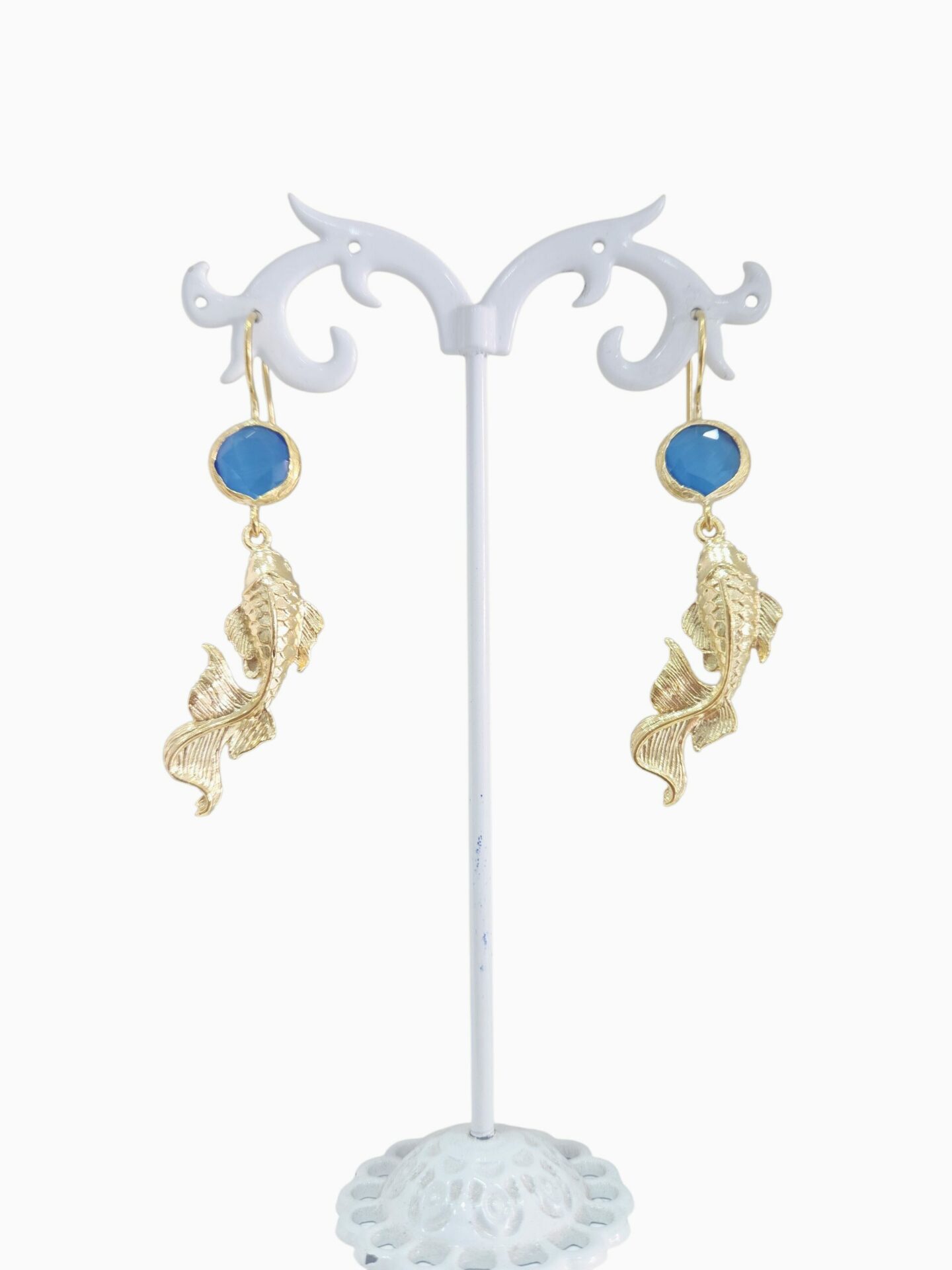 Orecchini realizzati con carpa in ottone,occhio di gatto azzurro e monachella.
lunghezza 5cm
peso 5.2gr Spedizione Gratuita