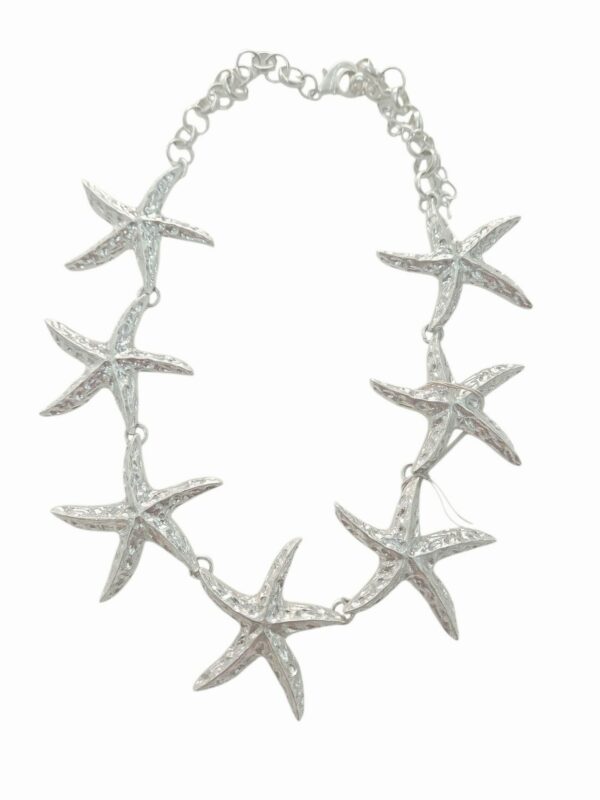 Collana girocollo anallergica regolabile realizzata con stelle argentate. 
lunghezza 55cm Spedizione Gratuita