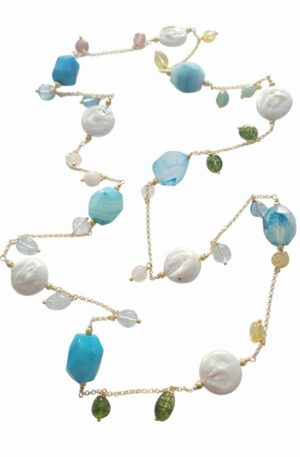 Collana lunga realizzata con agata esagonale striata, perle di fiume tonda e quarzi multicolore.lunghezza 73cm Spedizione Gratuita