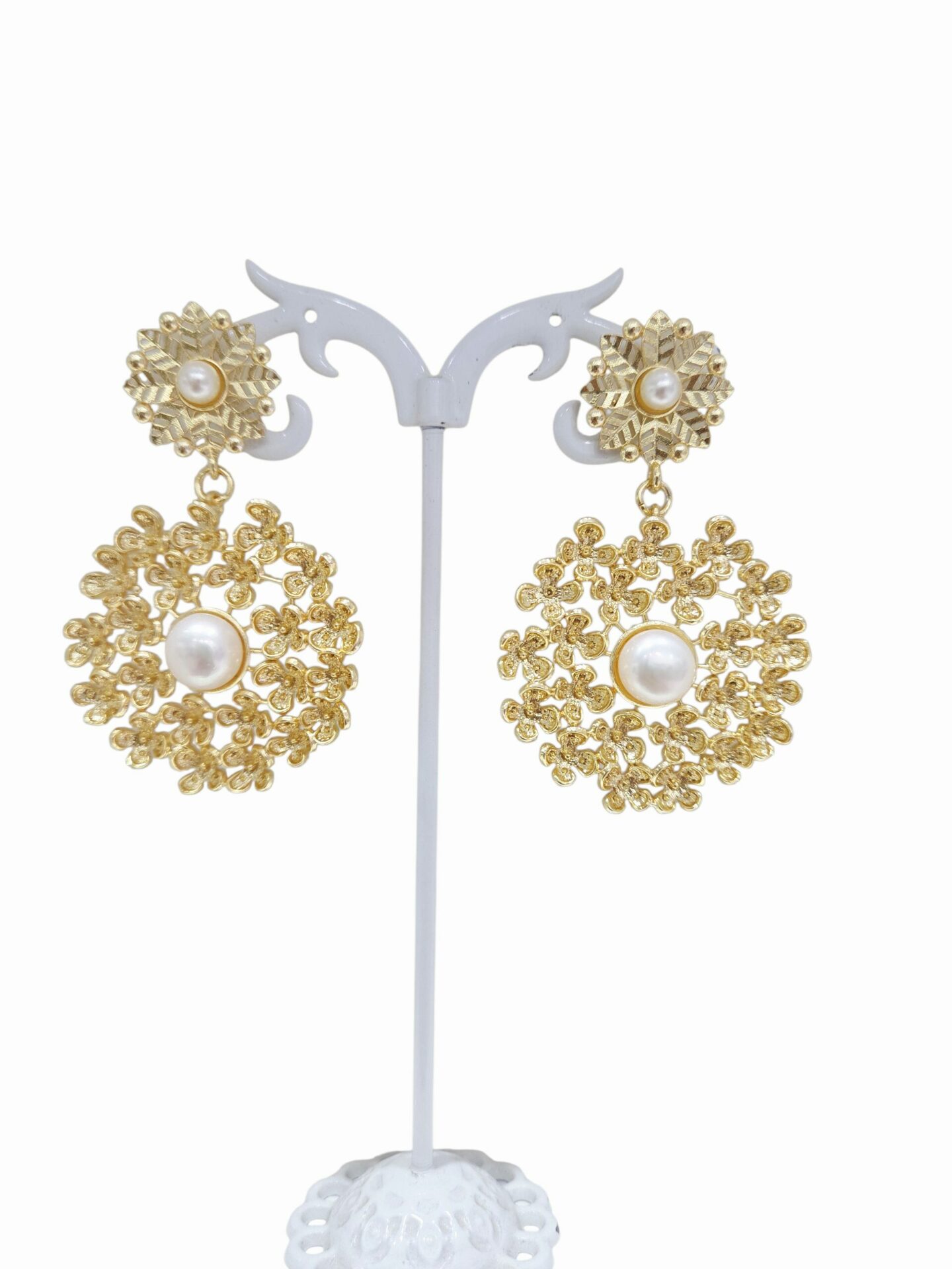 Orecchino realizzati con ottone e perla di fiume
lunghezza 5.5cm
peso 9.8gr Spedizione Gratuita