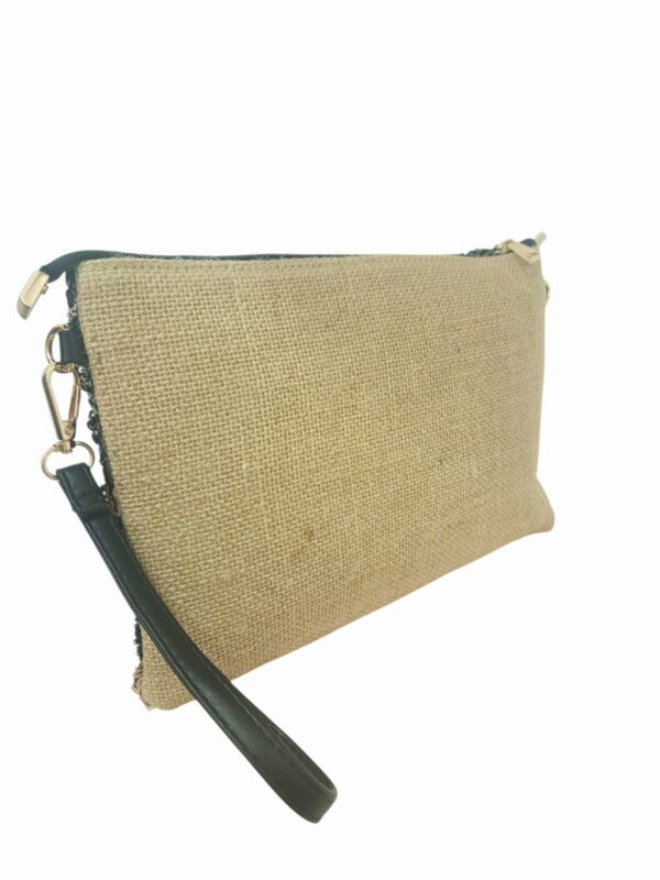 Borsa busta realizzata con paillettes e corda dotata di tracolla e polsiera.Misure 30x 20 Spedizione Gratuita