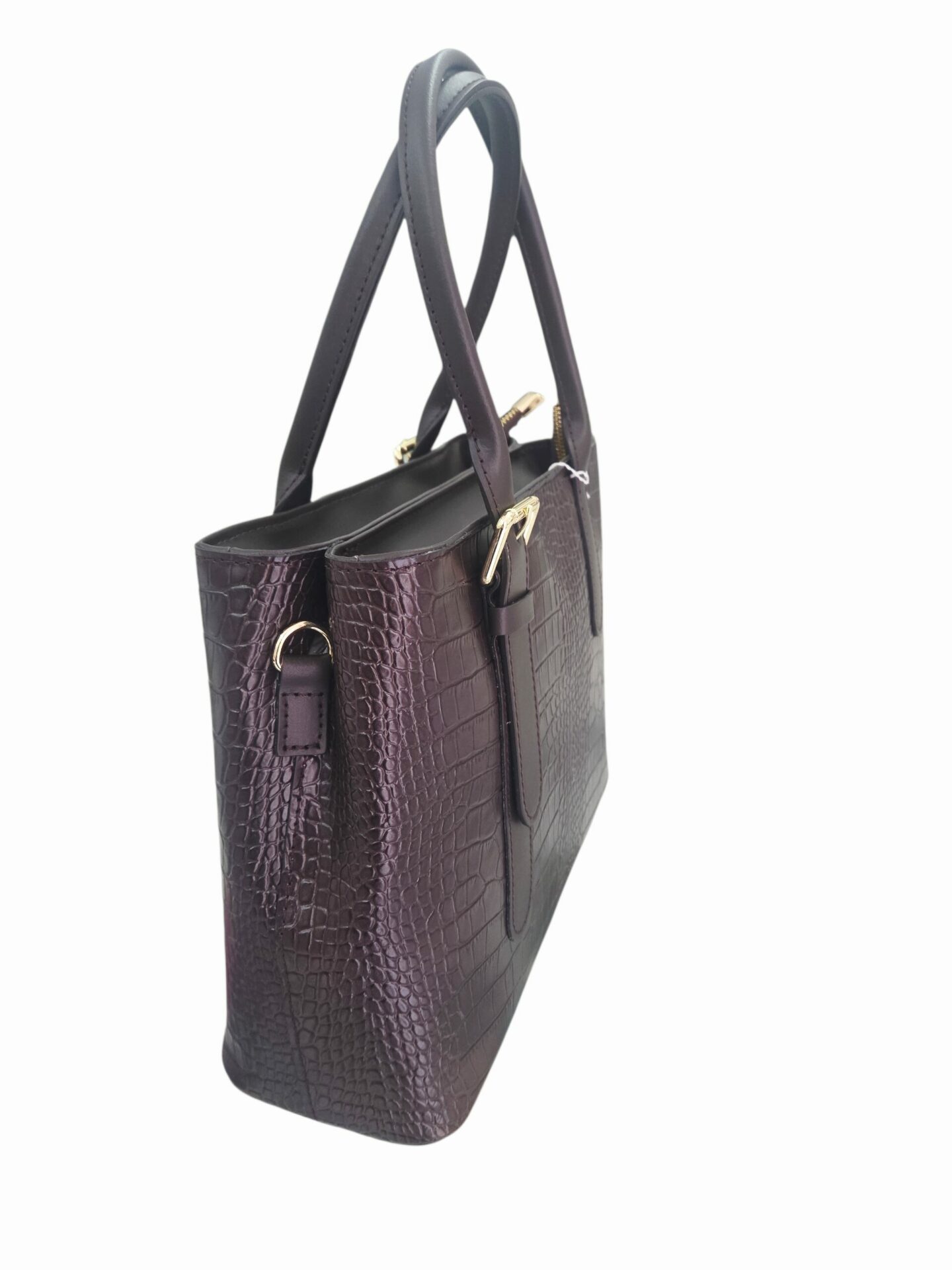 Borsa in vera pelle marrone cioccolato, stampo coccodrillo, con doppia apertura con zip, dotata di tracolla. interno foderato con tasche laterali. vera pelle made Italy 
misure L 31 B12  H24 Spedizione Gratuita