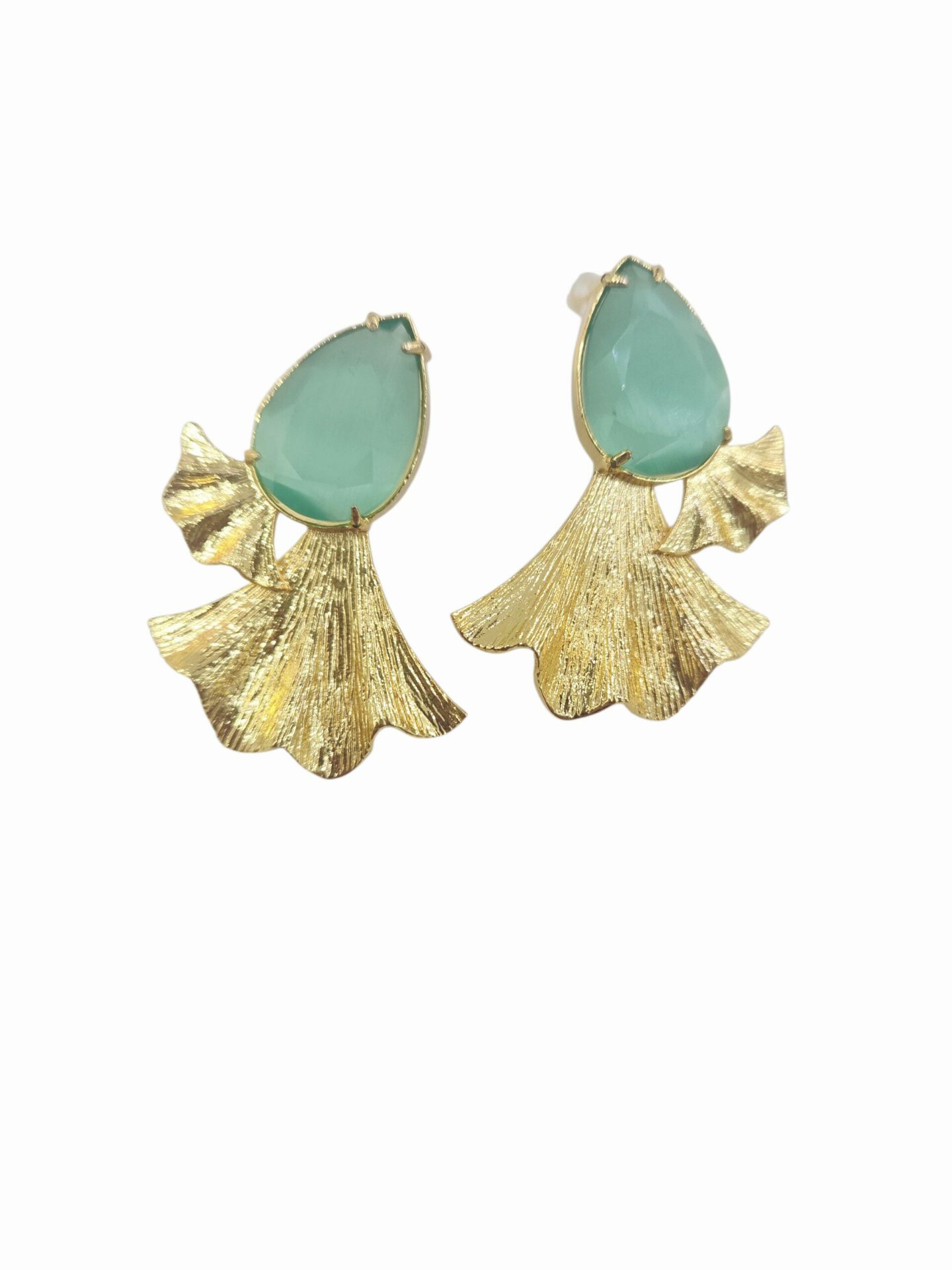 Orecchini realizzati con occhio di gatto verde acqua ed ottone
lunghezza 4cm
peso 6gr Spedizione Gratuita Orecchini realizzati con occhio di gatto verde acqua ed ottone
lunghezza 4cm
peso 6gr Spedizione Gratuita