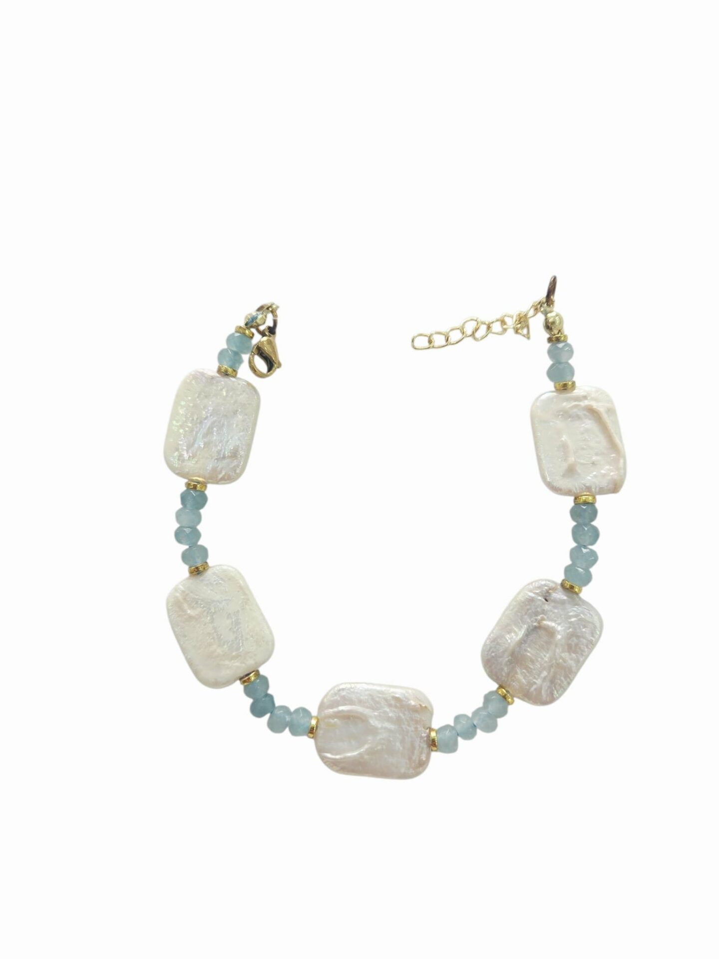 Bracciali regolabili realizzati con perle di fiume piatte,ematite e quarzi
Lunghezza 21cm Spedizione Gratuita