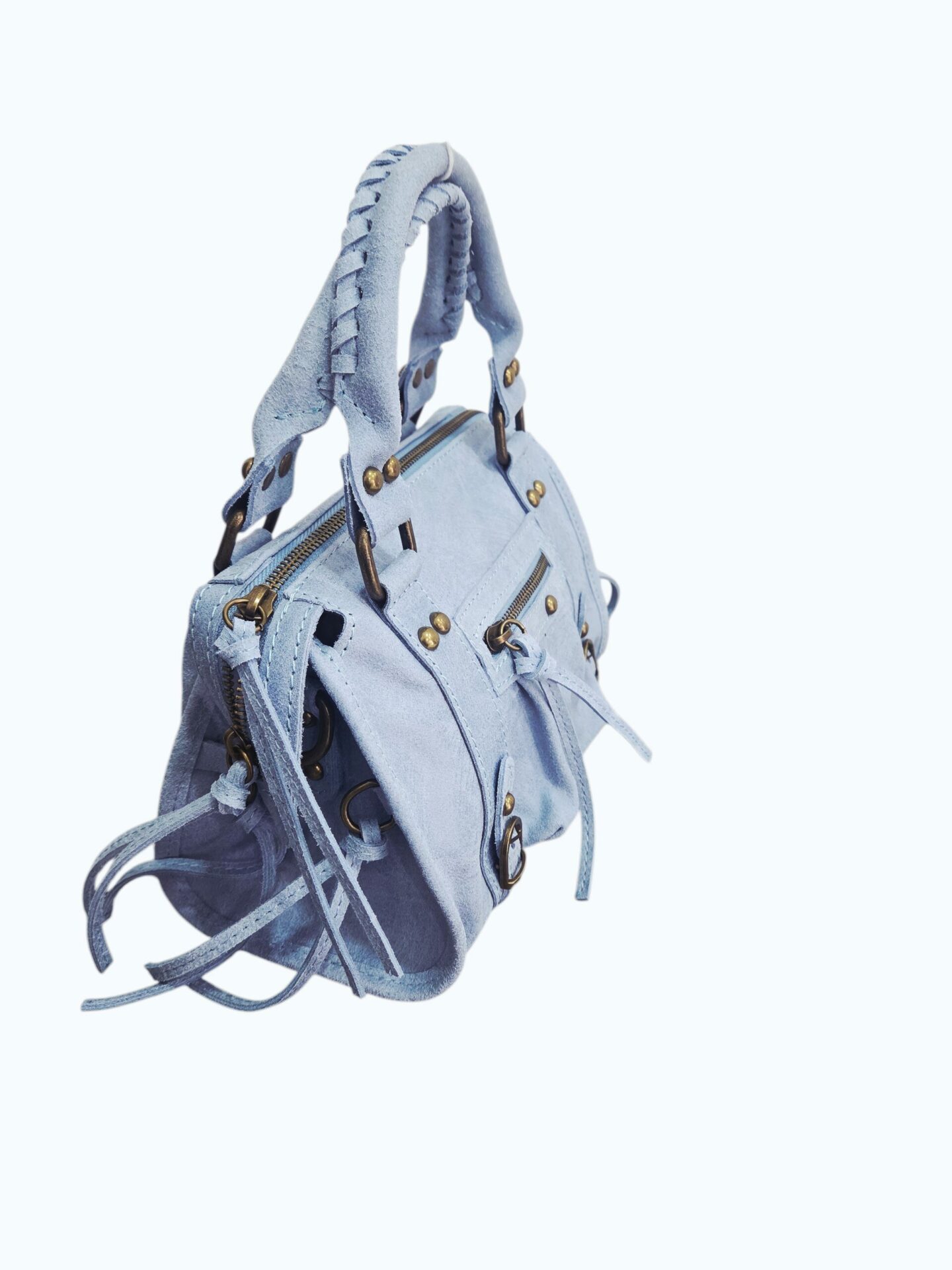 Borsa in vera pelle,made Italy,modello Balenciaga, interno foderato unico con tasche laterali.Dotata di tracolla,tacchetti alla base e chiusura con zip. modello medio.
colore celeste pastello 
misure H 19 B11 L 25 Spedizione Gratuita