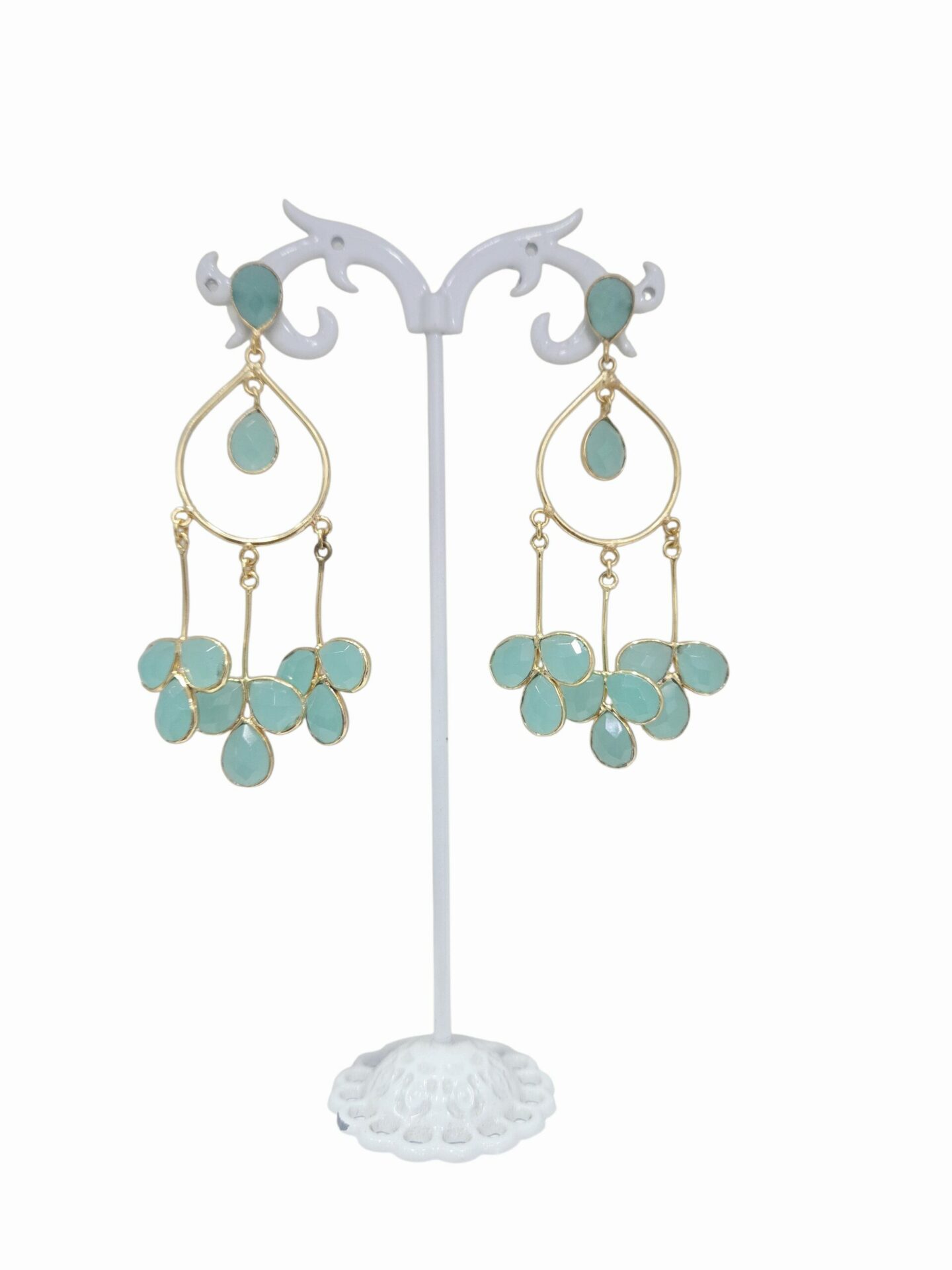 Orecchini  realizzati con ottone ed occhio di gatto color acqua marina.
lunghezza 8cm
peso 6gr Spedizione Gratuita