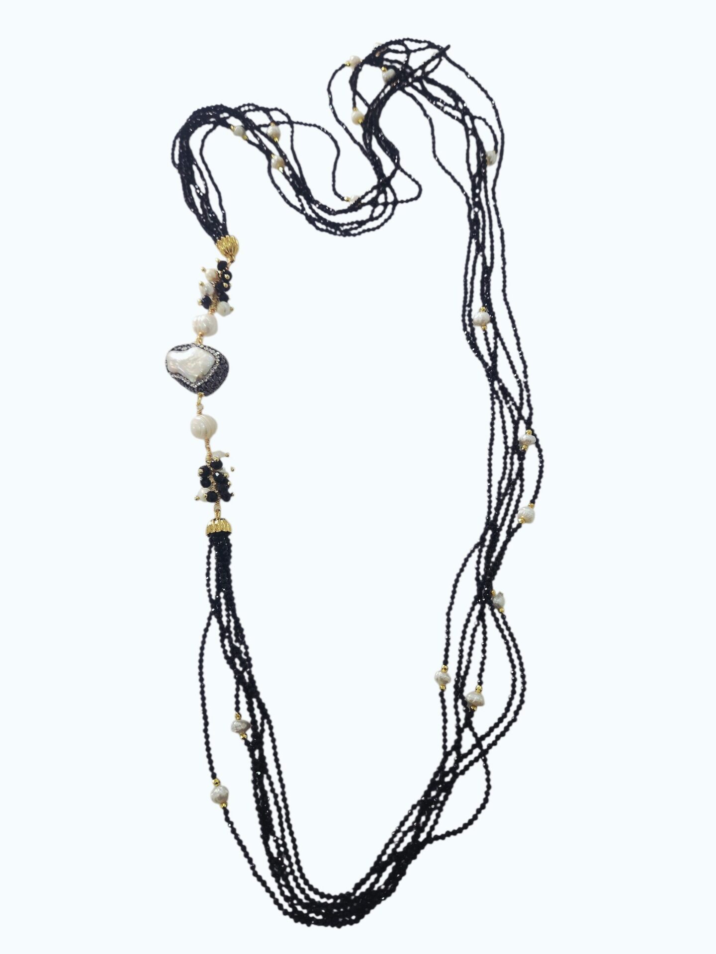 Collana lunga realizzata più fili di quarzi neri,perle di fiume e perla di Marocco con marcasite
lunghezza 90cm Spedizione Gratuita