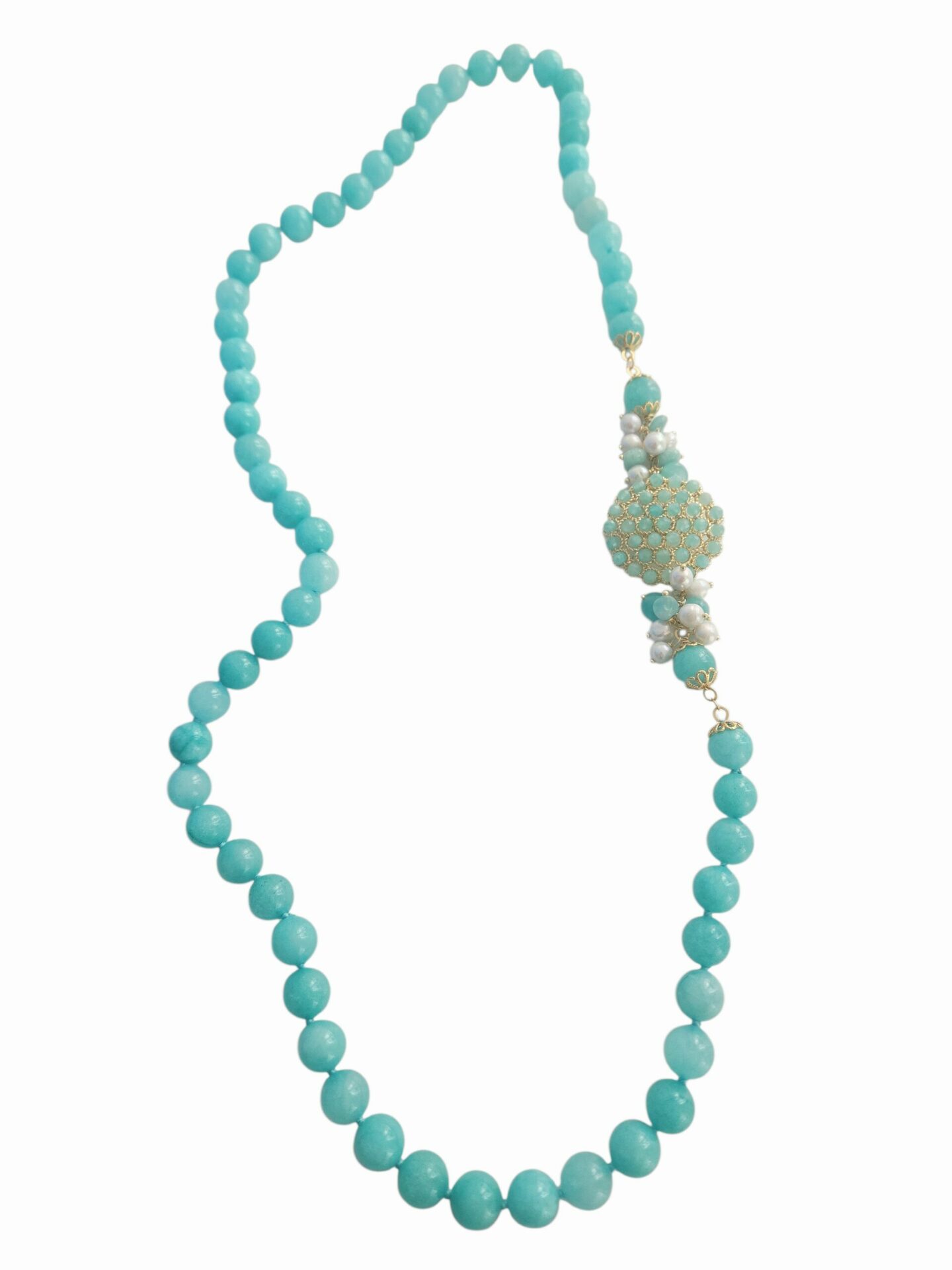 Collana realizzata con Giada color acqua marina e perle di fiume
lunghezza 75cm Spedizione Gratuita