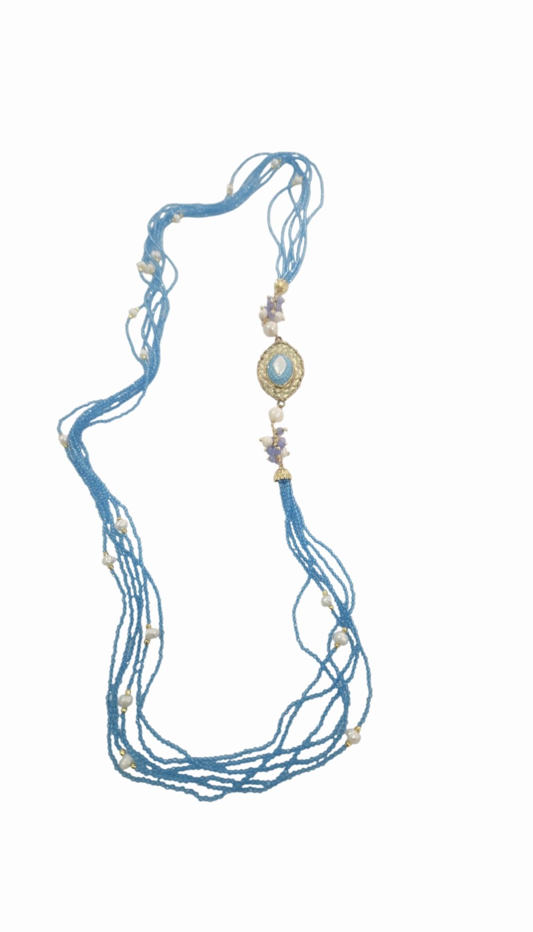 Collana lunga realizzata con più fili di quarzi turchesi,perle di fiume, agata e laterale con marcasite e perla barocca su base in ottone
lunghezza 87cm Spedizione Gratuita