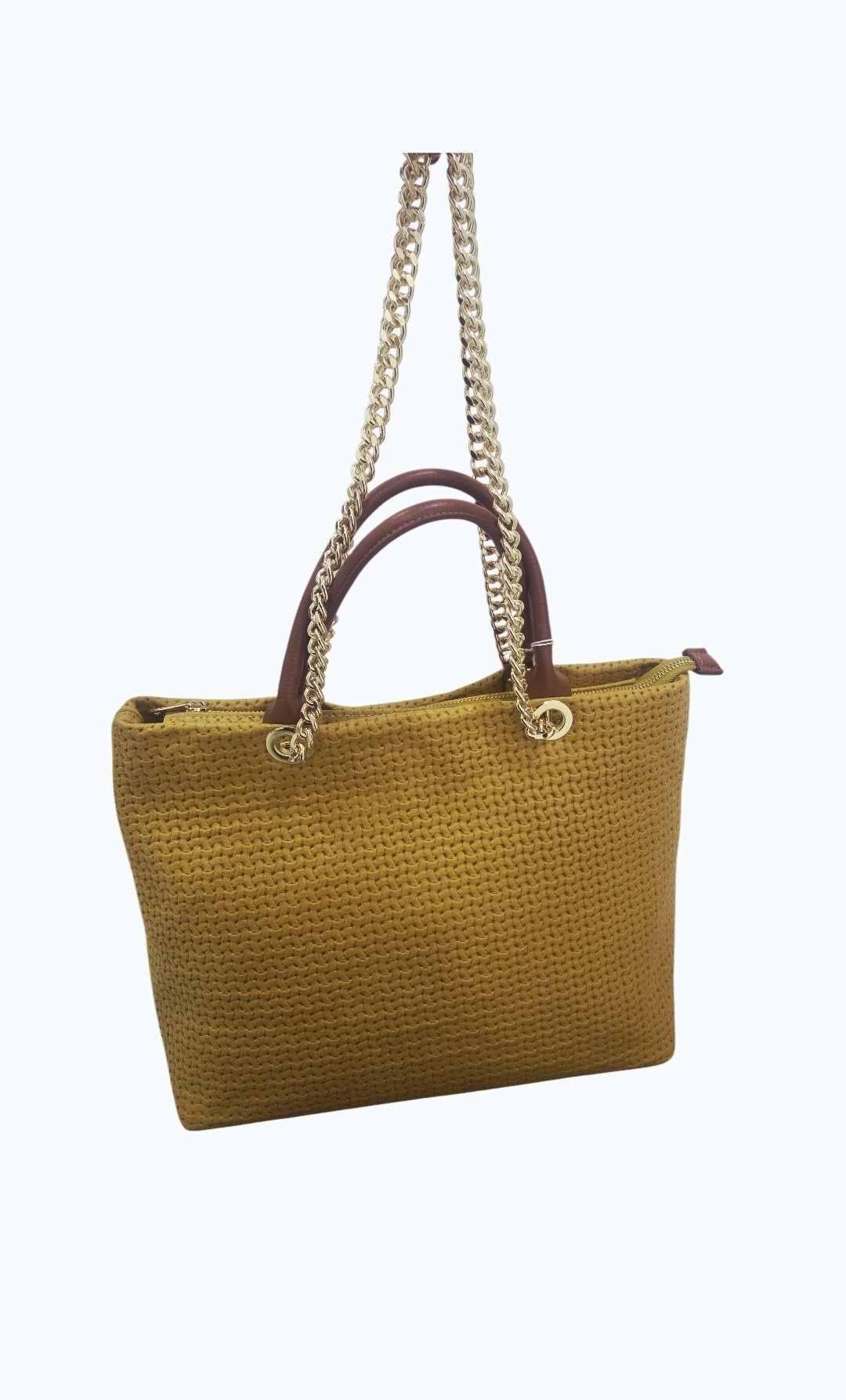 Borsa in vera pelle ocra, made Italy, con manico e base in cuoio e doppia catena dorata,interno unico foderatocon tasche laterali, chiusura con zip.
misure L38 B15 H28 Spedizione Gratuita
