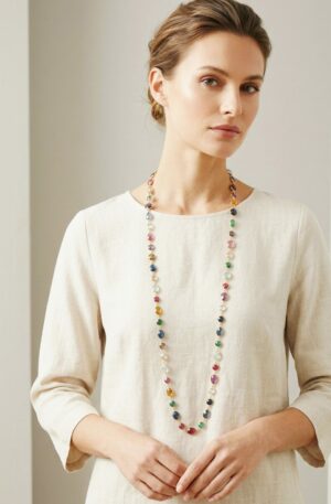 Collana lunga realizzata con quarzi multicolore contornati da ottone in varie forme possibilità di farla doppio giro.lunghezza 1m Spedizione Gratuita