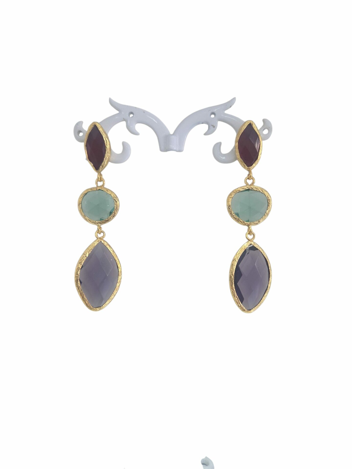 Orecchini  realizzati con quarzi multicolore e varie forme contornati da ottone
lunghezza 6cm
peso 5.1gr Spedizione Gratuita