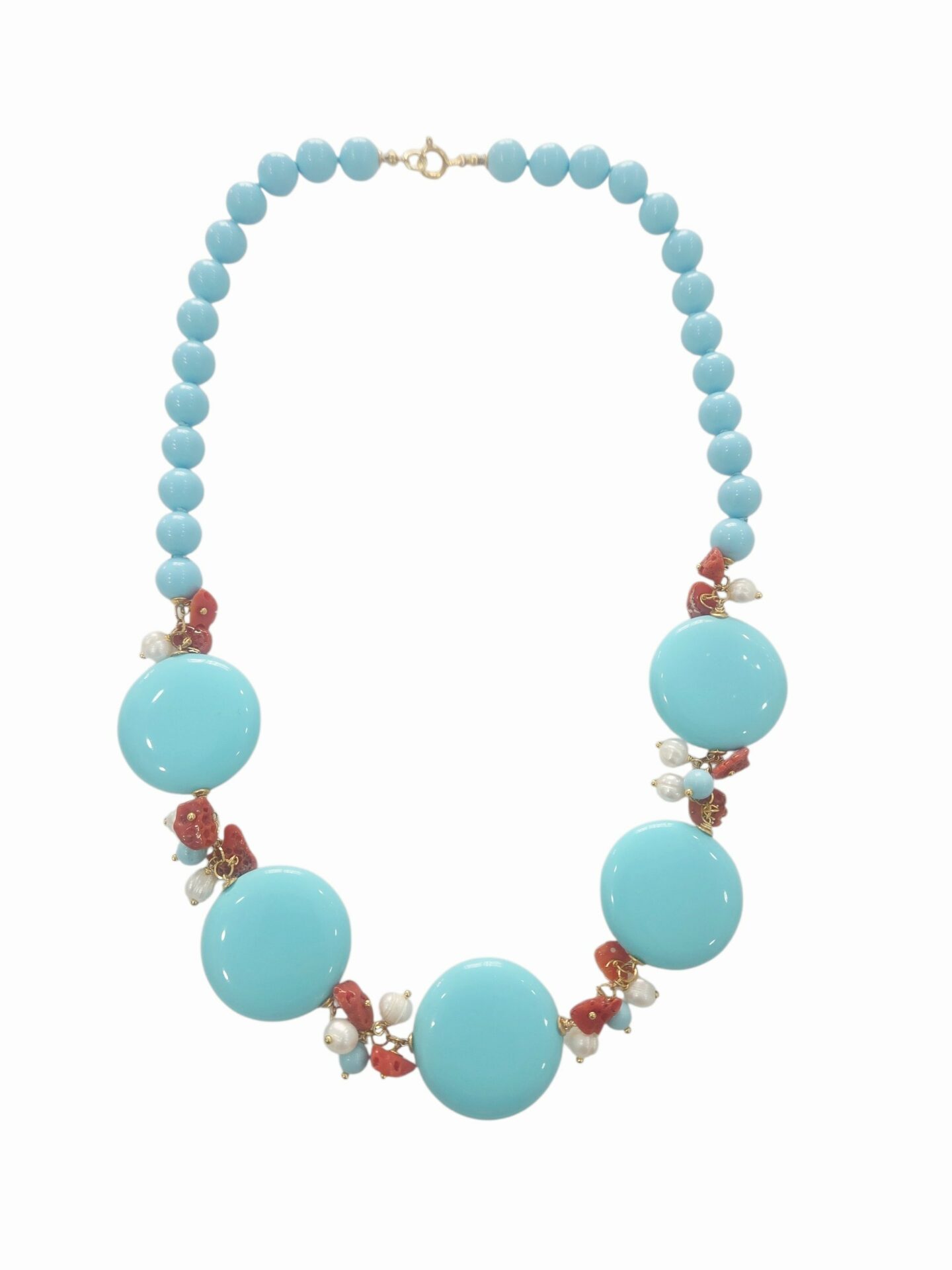 Collana realizzata con pasta di turchese,corallo e perle di fiume
lunghezza 56cm Spedizione Gratuita