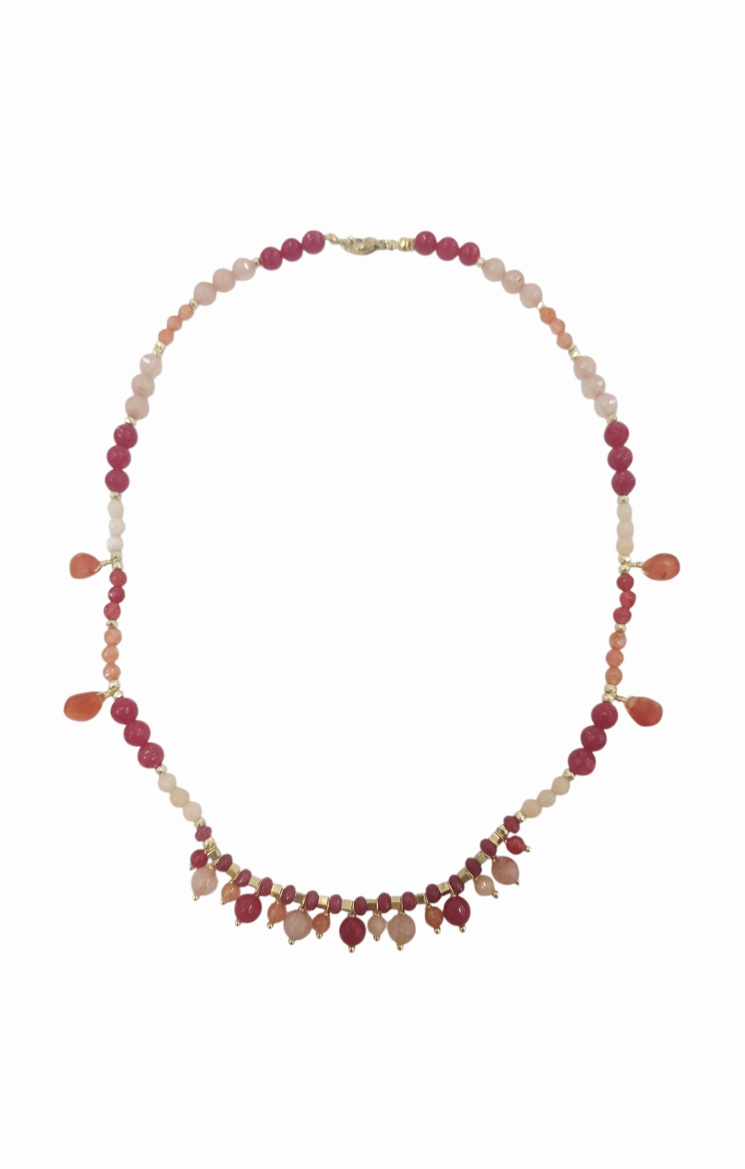 Collanina girocollo realizzata con quarzi rossi, salmone e arancio. Rondelle dorate in ematite
lunghezza 47cm Spedizione Gratuita