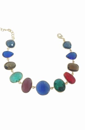 Bracciale regolabile realizzato con quarzi multicolore e forme irregolari contornate da ottone 
lunghezza 23.5cm Spedizione Gratuita
