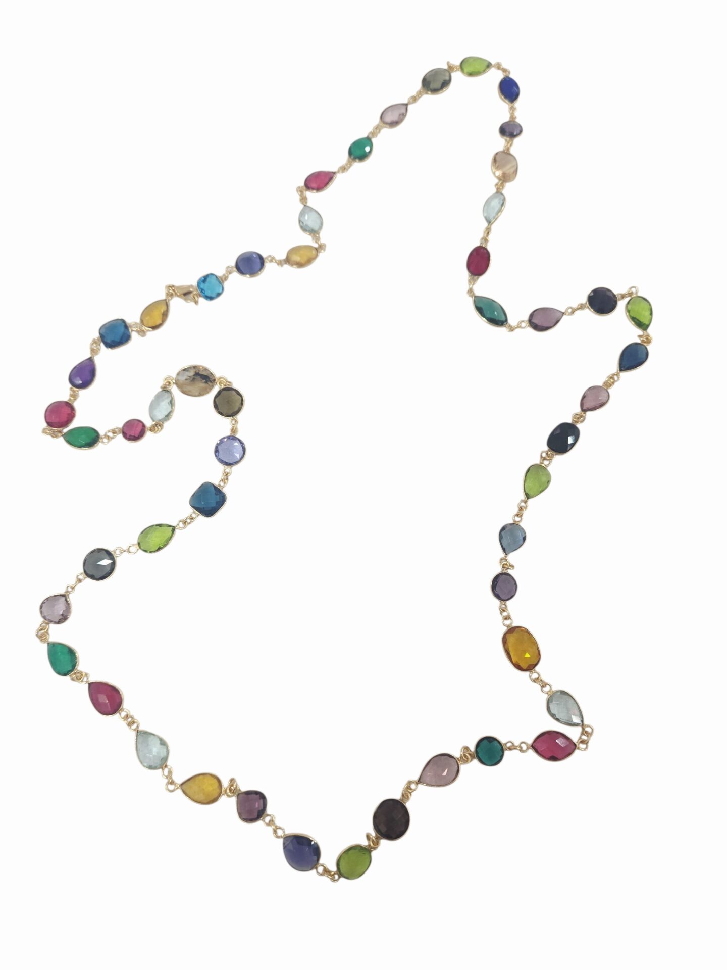 Collana lunga realizzata con quarzi multicolore contornati da ottone in varie forme possibilità di farla doppio giro.
lunghezza 1m Spedizione Gratuita